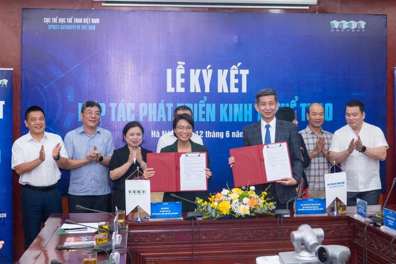 Cục Thể dục Thể thao Việt Nam ký kết hợp tác thúc đẩy kinh tế thể thao - Ảnh 1.