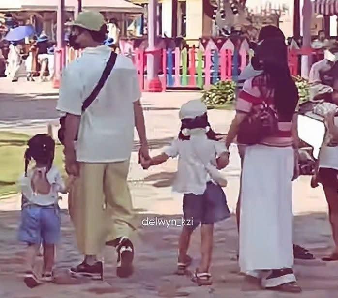 "Tóm dính" cặp ca sĩ Vbiz bí mật yêu 6 năm đi chơi riêng cùng 2 em bé- Ảnh 1.
